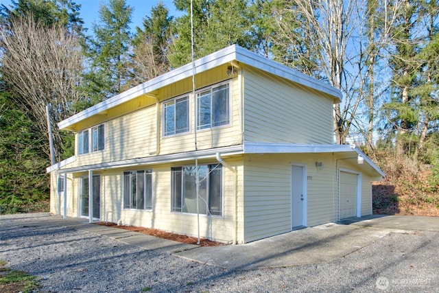 view of home's exterior featuring a garage