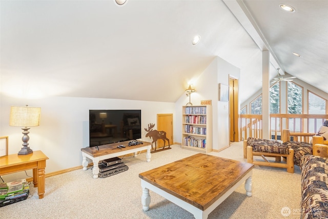 living area featuring vaulted ceiling with beams, baseboards, a ceiling fan, and light colored carpet