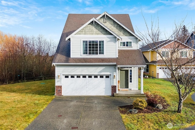 craftsman inspired home featuring a front lawn and a garage