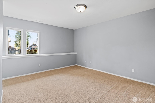 spare room with carpet flooring