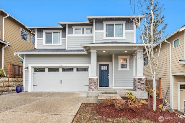 view of front of house featuring driveway, a garage, a shingled roof, covered porch, and board and batten siding