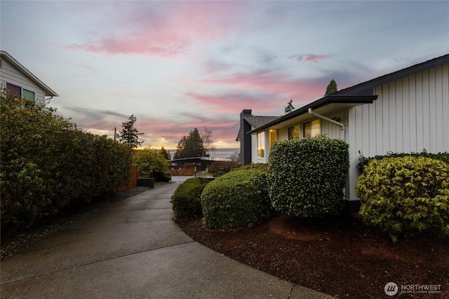 view of property exterior at dusk