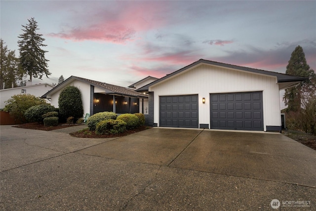 ranch-style home featuring a garage