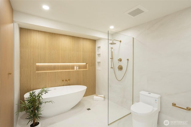 bathroom with toilet, tile walls, and shower with separate bathtub