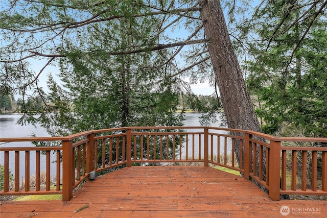 wooden terrace with a water view