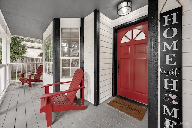 property entrance with covered porch