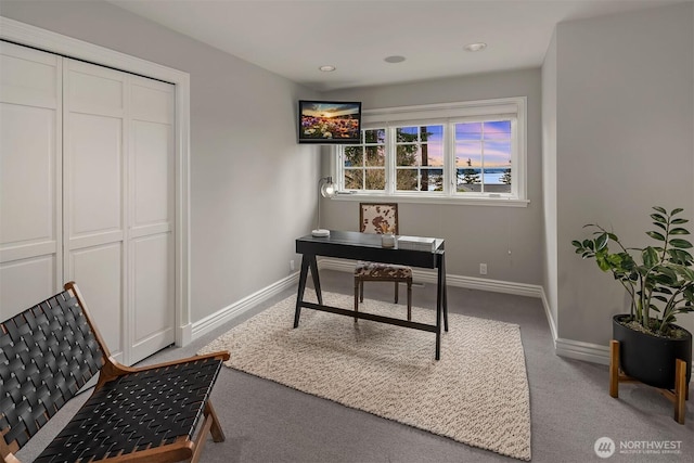 office space featuring recessed lighting, light colored carpet, and baseboards