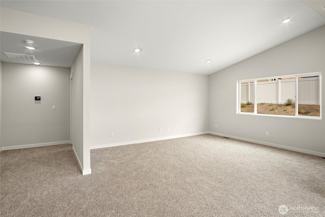 unfurnished room featuring carpet, recessed lighting, visible vents, vaulted ceiling, and baseboards