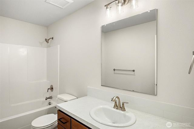 full bath featuring toilet, visible vents, shower / bathing tub combination, and vanity