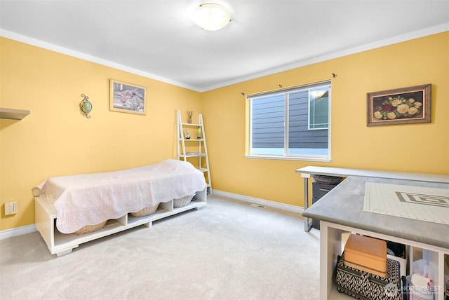 carpeted bedroom with ornamental molding