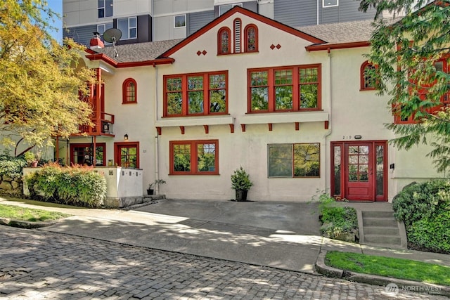 view of front of house featuring stucco siding