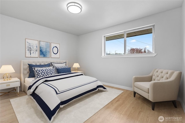 bedroom featuring light wood-type flooring