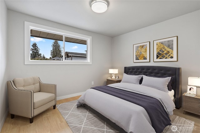 bedroom featuring light wood-type flooring