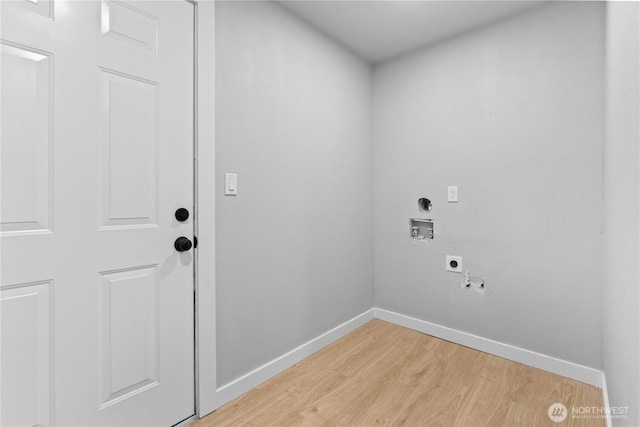 laundry area featuring light hardwood / wood-style flooring, washer hookup, and hookup for an electric dryer