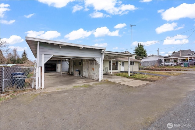 view of front of house featuring a carport