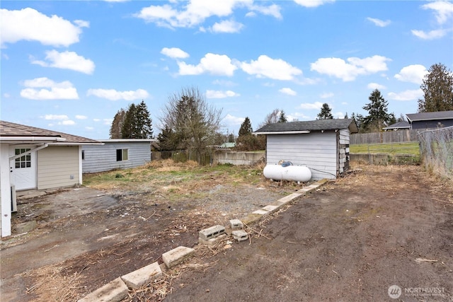 view of yard with a storage shed