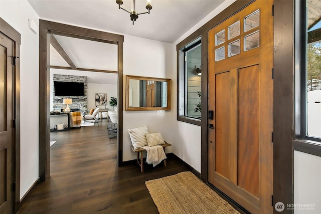 foyer entrance with dark hardwood / wood-style floors