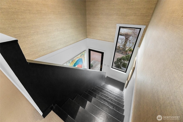 stairway featuring hardwood / wood-style flooring