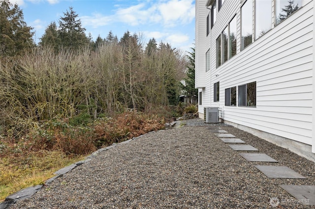 view of yard featuring central AC