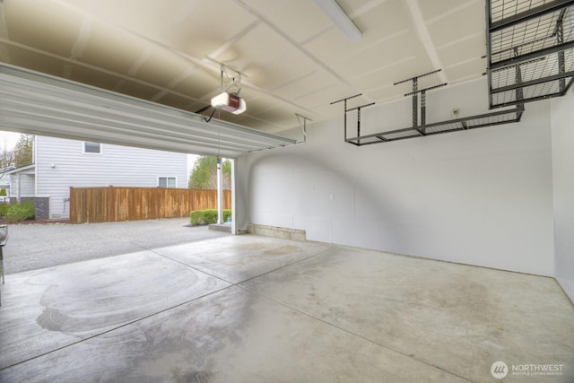 garage featuring a garage door opener