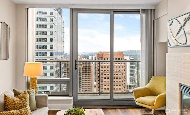 interior space featuring hardwood / wood-style floors and expansive windows