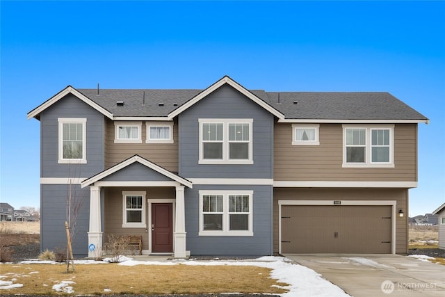 view of front of home with a garage