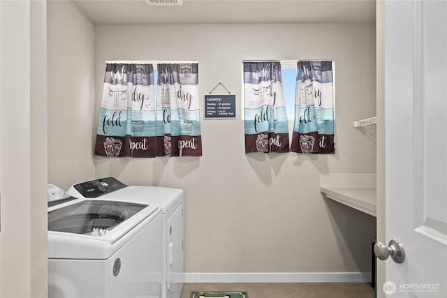 laundry area featuring washing machine and dryer