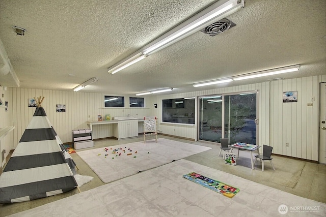 interior space featuring a textured ceiling