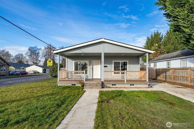 view of front of house featuring a front lawn and a porch