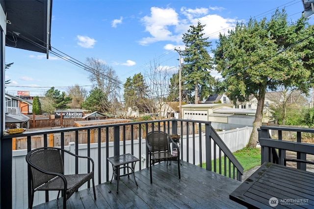 wooden deck featuring fence