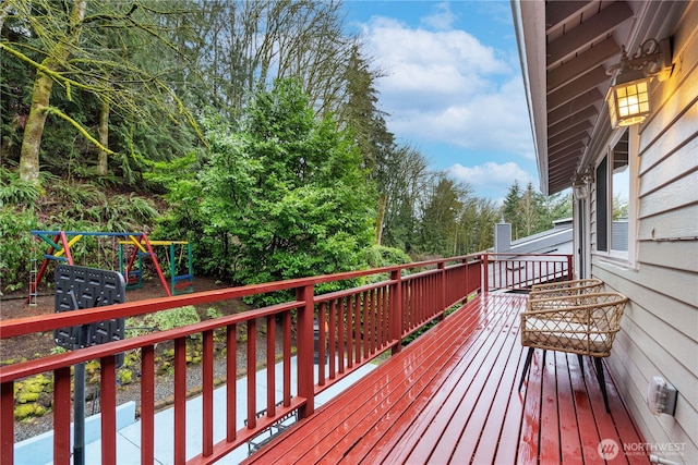 wooden deck with a playground