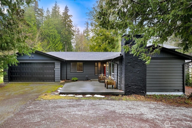 ranch-style home with a garage