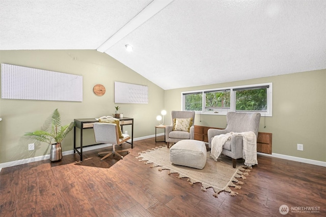 living area with a textured ceiling, dark hardwood / wood-style flooring, and lofted ceiling with beams