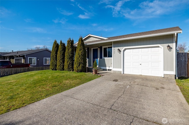 ranch-style house with a garage, driveway, a front lawn, and fence