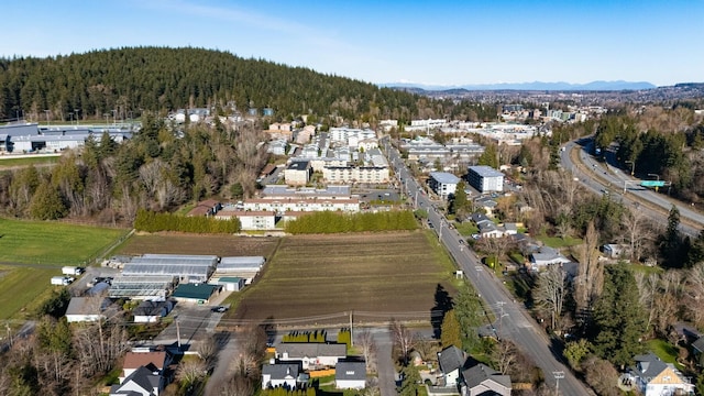 aerial view with a wooded view