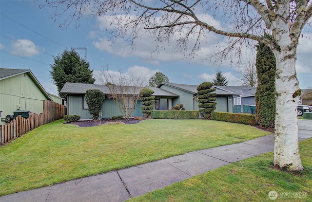 single story home with a front yard