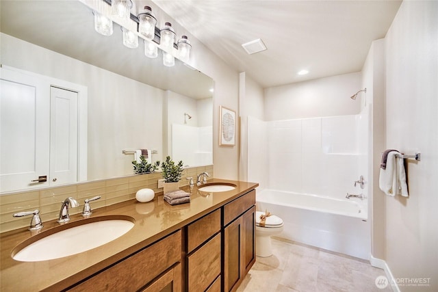 full bathroom featuring tile patterned flooring, toilet, shower / bathtub combination, vanity, and decorative backsplash