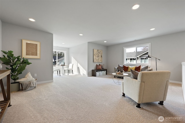 living room with carpet flooring, a wealth of natural light, and recessed lighting