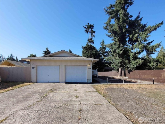 detached garage with fence