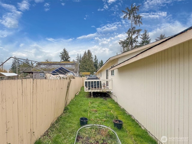 view of yard featuring fence