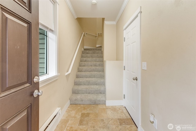 stairway featuring a baseboard radiator and ornamental molding