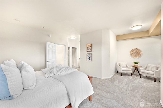 bedroom featuring carpet floors and baseboards