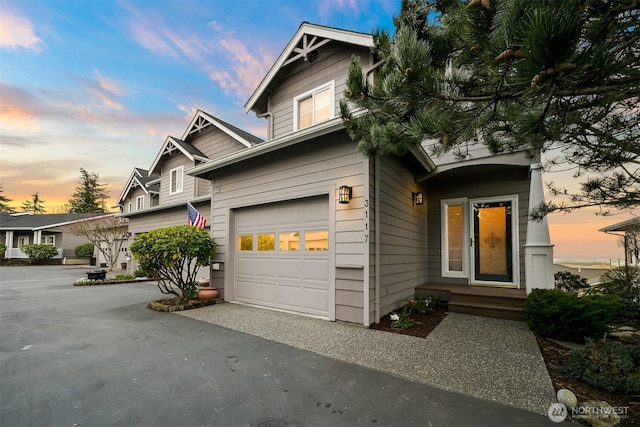 view of front facade featuring an attached garage and driveway