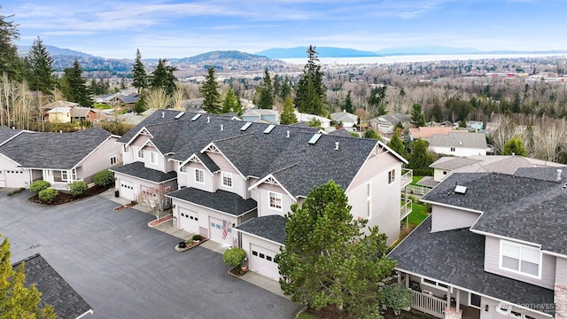 bird's eye view featuring a mountain view and a residential view