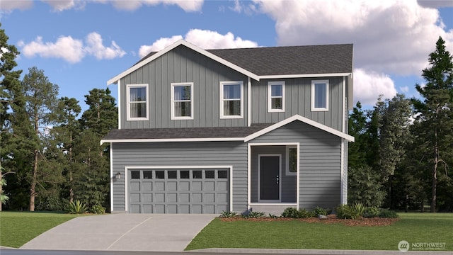 view of front of home featuring a garage and a front lawn