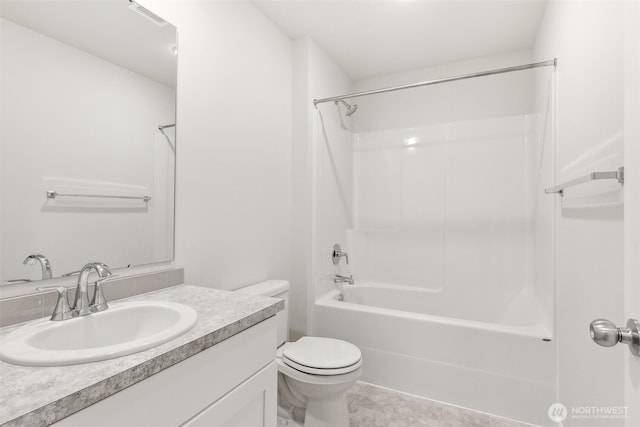 full bathroom with washtub / shower combination, toilet, and vanity