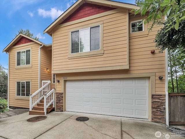 front facade with a garage