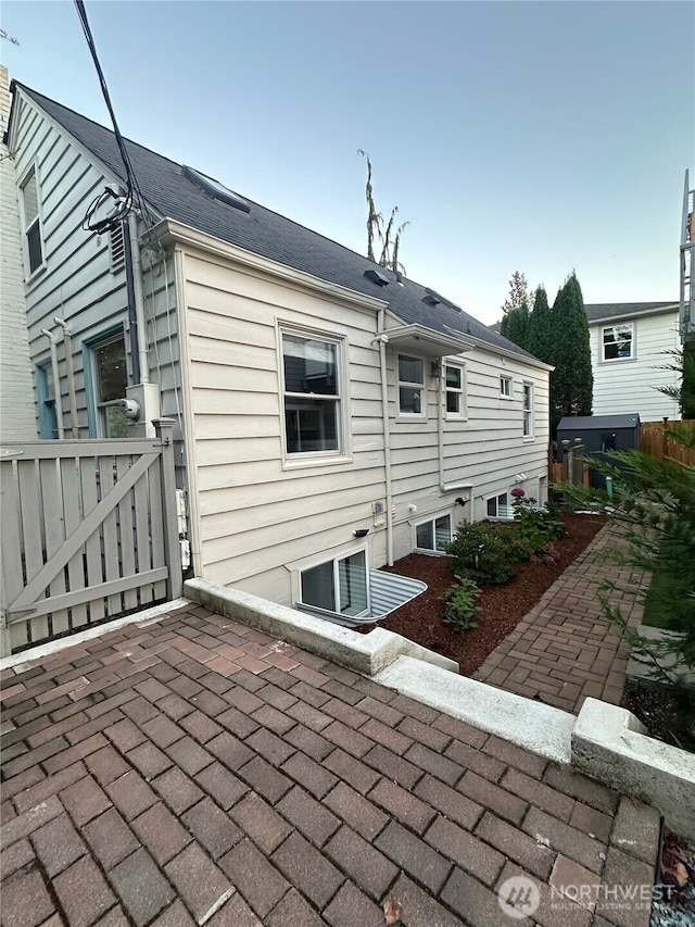 back of house featuring a patio