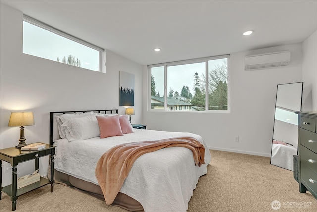 bedroom with recessed lighting, baseboards, an AC wall unit, and light colored carpet