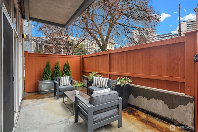 view of patio / terrace with outdoor lounge area and a fenced backyard